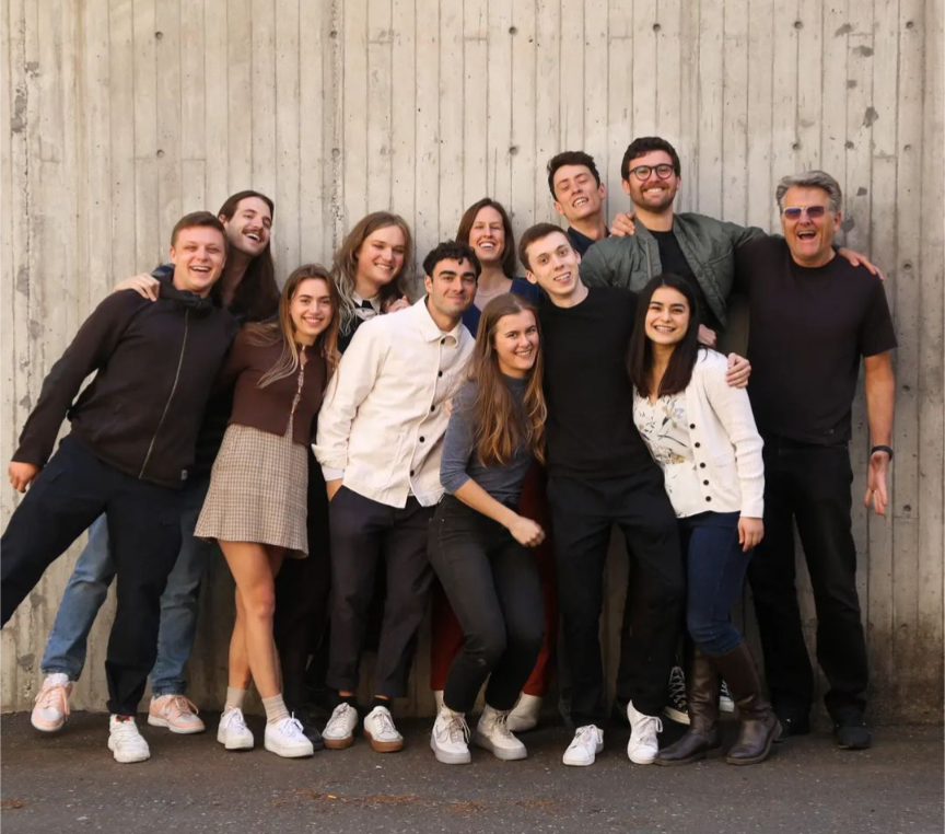 Students posing with Professor Aruns Oslapas